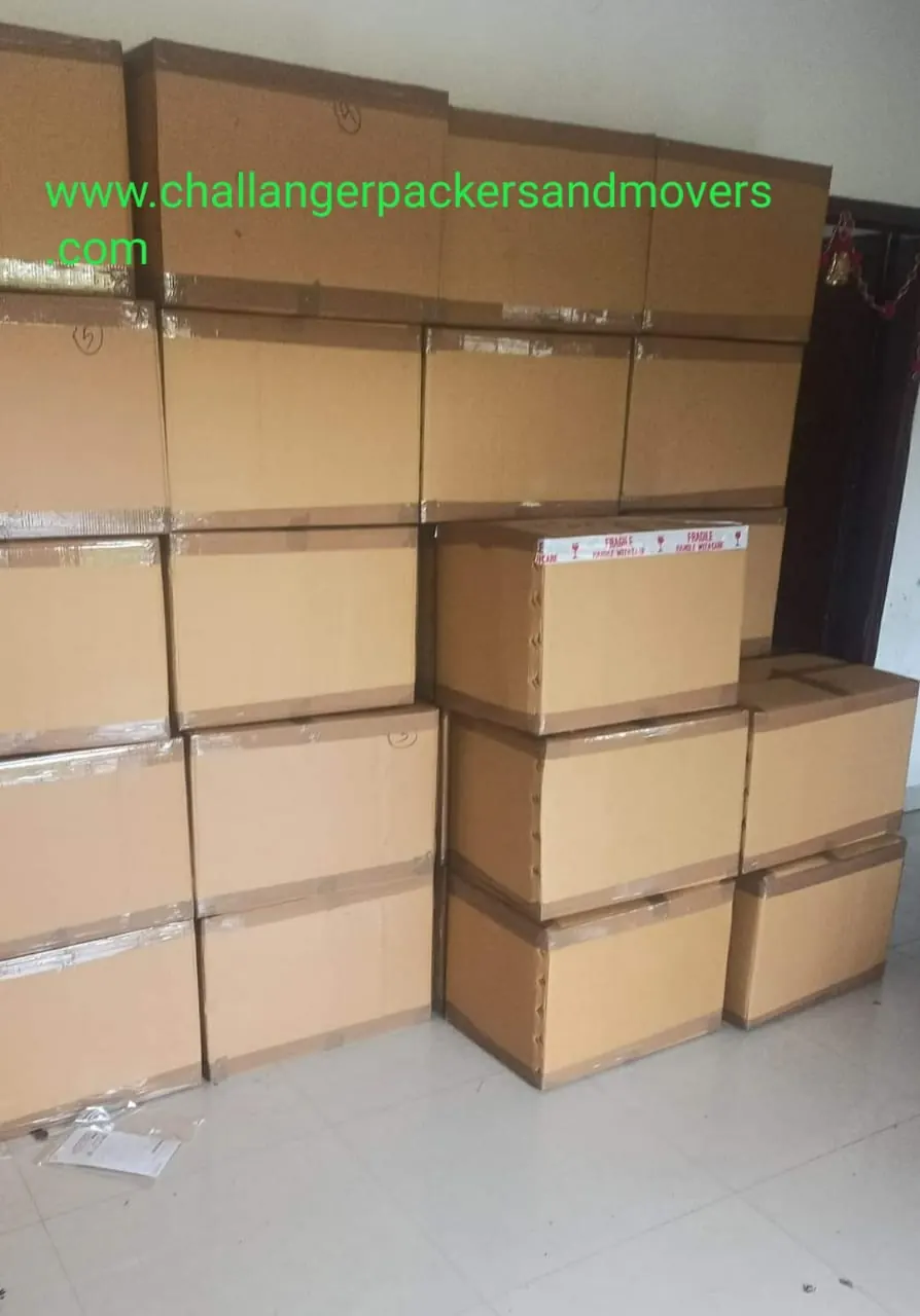 Packed cartons stacked in storage in Trichy